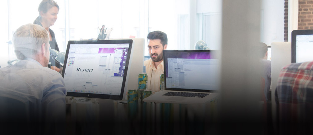 Image focused on worker in an office.